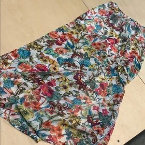 Long white skirt with flowers and butterflies